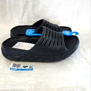 Hoka one one.  Ora recovery slide size men 10 and women 12